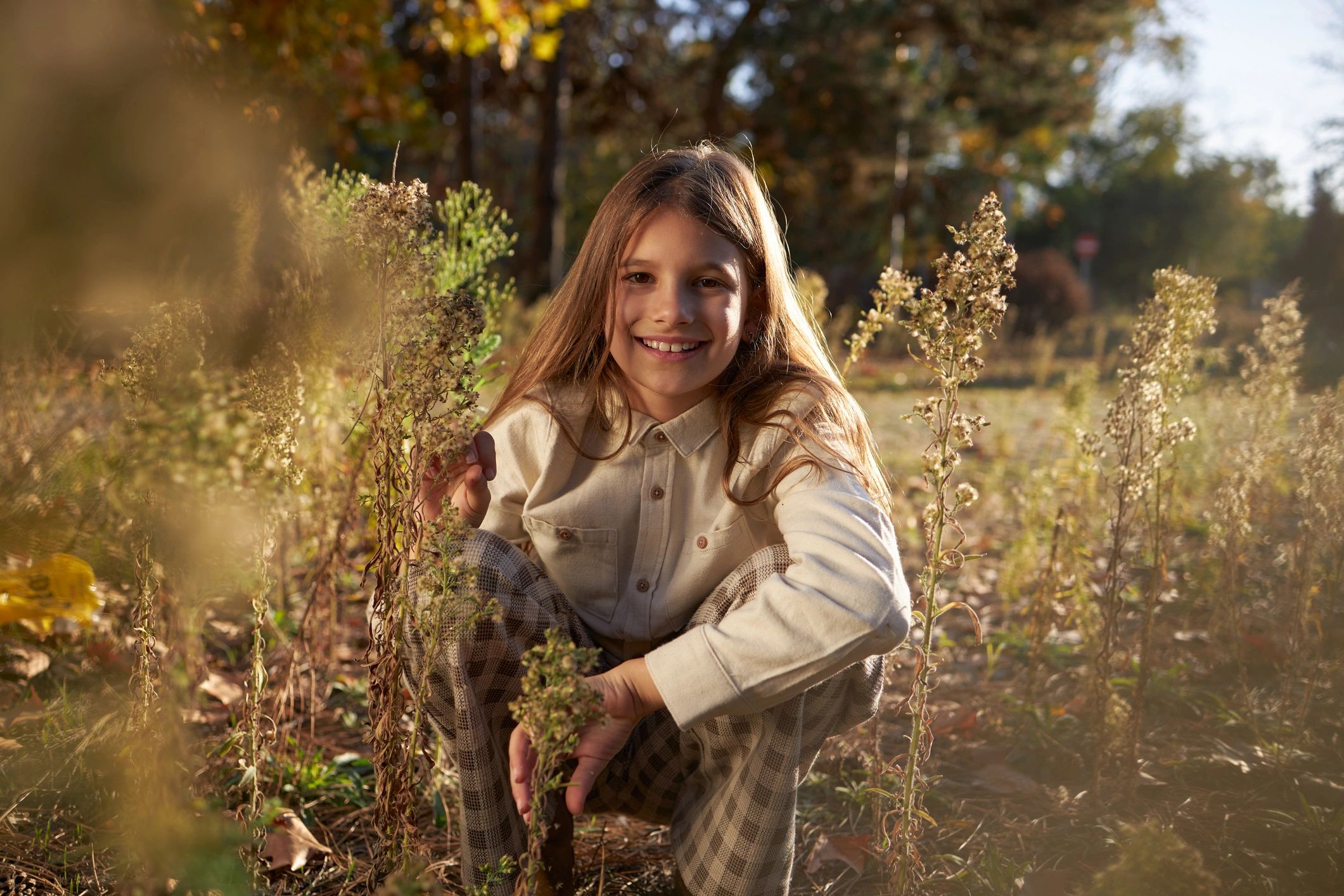 Child in an elegant outfit outdoors